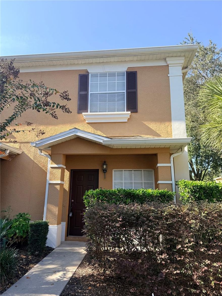 Welcome to 807 Chelsea Dr, a stunning 2-bedroom, 2.5-bathroom corner townhouse located in the heart of Davenport, FL. This home is nestled within a secure, gated community, offering an extra layer of peace and security. The interior boasts a fresh, new white paint job throughout, complemented by the modern aesthetic of tile and plank flooring - no carpets to worry about! The home comes fully equipped with all necessary appliances, including a washer and dryer for your convenience. The property also features a screened patio with storage, perfect for enjoying the Florida weather or hosting gatherings. The community amenities are sure to impress, with a sparkling pool and hot tub for residents to enjoy. Plus, the location is unbeatable - you'll be close to all shopping necessities. Come and experience the comfort and convenience of 807 Chelsea Dr, your new home awaits!