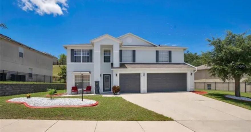 This spacious 7-bedroom, 4-bathroom single-family home offers over 4,000 sq ft of living space, providing plenty of room for a large family, entertaining, or multi-generational living. As you enter through the front entryway, you’ll notice the bright and open layout designed for both comfort and functionality. The home features a modernized kitchen with updated cabinetry, a large island, and ample counter space, perfect for preparing meals and gathering with family and friends. The open living and dining areas create a welcoming atmosphere for everyday living and special occasions. The generously sized bedrooms provide flexibility for guest rooms, home offices, or hobby spaces. Upstairs includes additional living space that can be used as a media room, playroom, or lounge area. The bathrooms feature tasteful finishes and plenty of storage. Outside, enjoy the private yard and landscaped surroundings, ideal for relaxing, entertaining, or enjoying the beautiful Florida weather. A 3-car garage and wide driveway provide plenty of parking and storage. Conveniently located just minutes from shopping, dining, major highways, and local attractions, this home combines space, comfort, and convenience in one exceptional property.