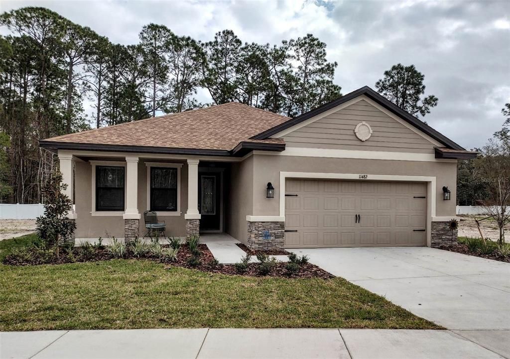 Photo of 11482 WEAVER HOLLOW, NEW PORT RICHEY, FL 34654 (MLS # J957456)