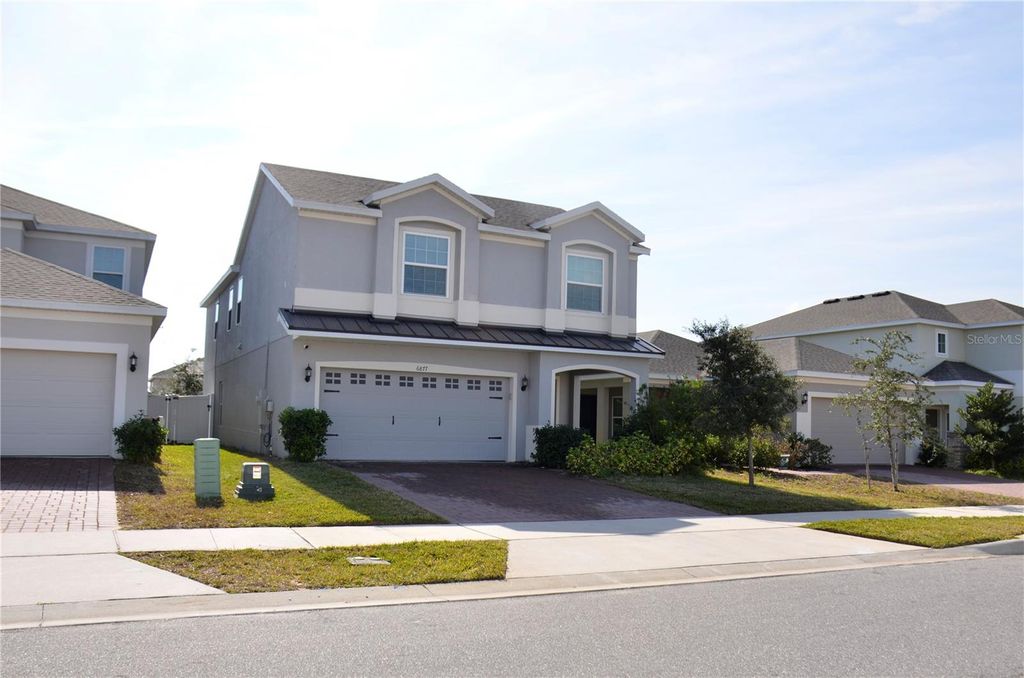 Photo of 6877 Wilson Hammock Avenue, Groveland, FL 34736 (MLS # O6371217)