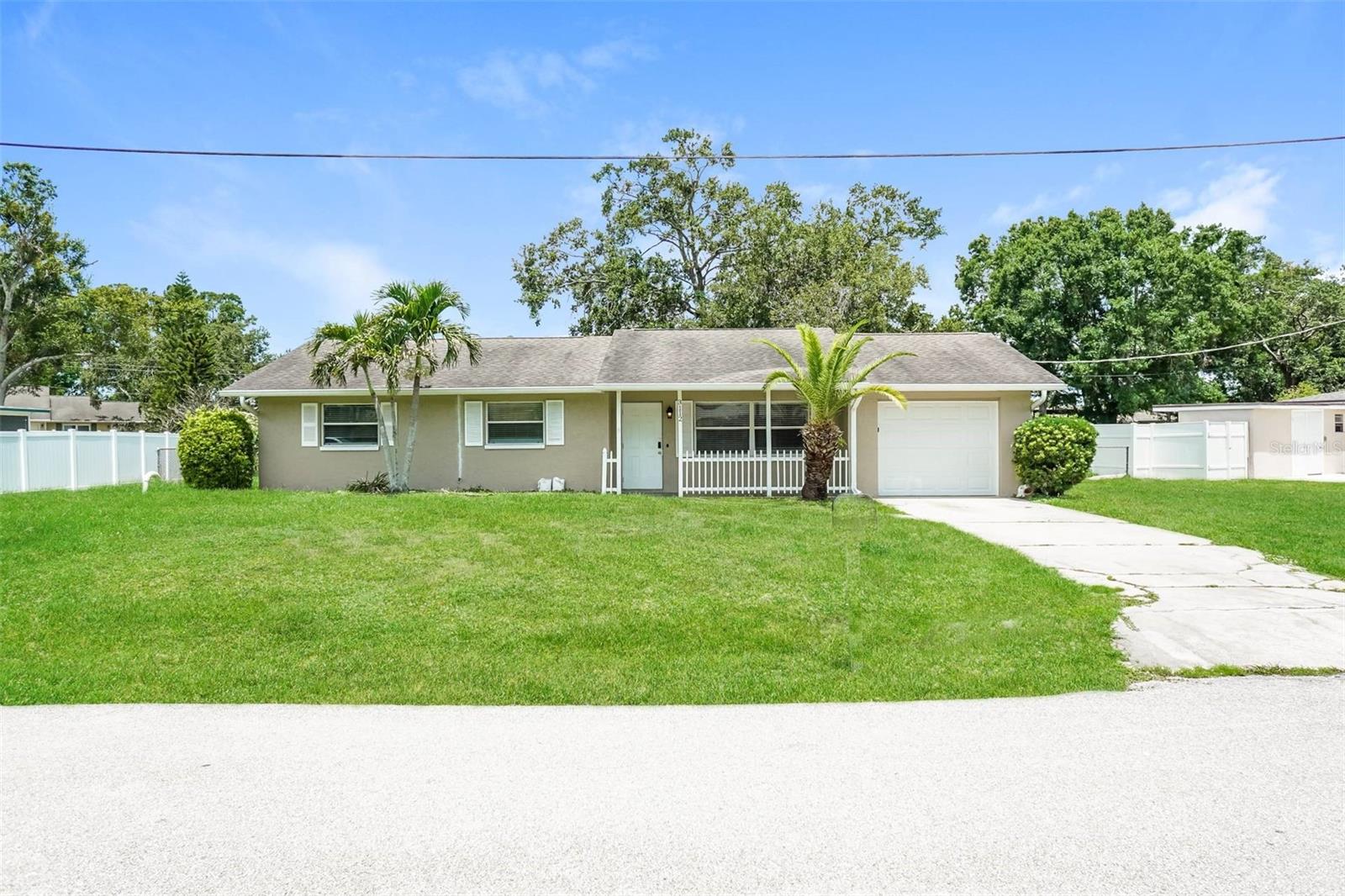 Discover this charming 3-bedroom, 2-bathroom pet-friendly home offering 1,294 sq ft of comfortable living space. The kitchen is equipped with modern appliances including a refrigerator, microwave, range oven, and dishwasher. Enjoy the convenience of an attached garage and the comfort of ceiling fans and window coverings, no carpet. The property features a fenced yard, offering additional utility and space. With a bathtub included in the amenities, this home ensures a relaxed living experience. Schedule a tour to explore all the features of this welcoming home today!