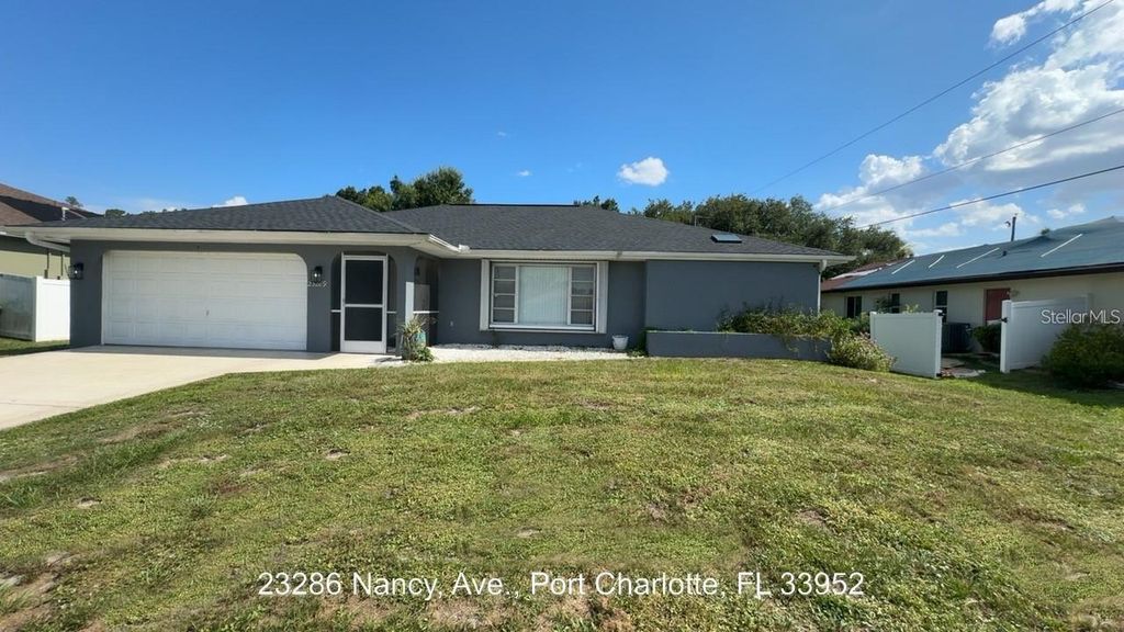 Photo of 23289 Nancy Avenue, Port Charlotte, FL 33952 (MLS # D6146659)