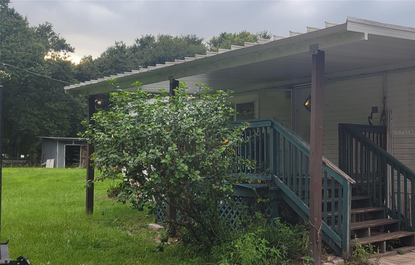 Escape to peaceful country living with this 3-bedroom, 2-bath mobile home, ideally located just over an acre. The roof was just replaced 3 years ago and although the home needs a little TLC, it is spacious and versatile enough to make it your own. Just off the kitchen is the indoor laundry area which leads to a deck where you can relax or enjoy a morning coffee. The expansive yard is for those who appreciate and enjoy nature, offering plenty of space for gatherings, outdoor activities, gardening, or even storage for heavy machinery. Whether you have been looking for country living or want a property to invest in, this lot offers endless possibilities, including the potential for farming.
The property also offers two storage sheds in the back, where you can store your tools, toys, or hobbies. Located just minutes from I-4, you'll have a quick and easy commute to Tampa, Lakeland and surrounding areas.
More photos coming soon!
Schedule your showing today!