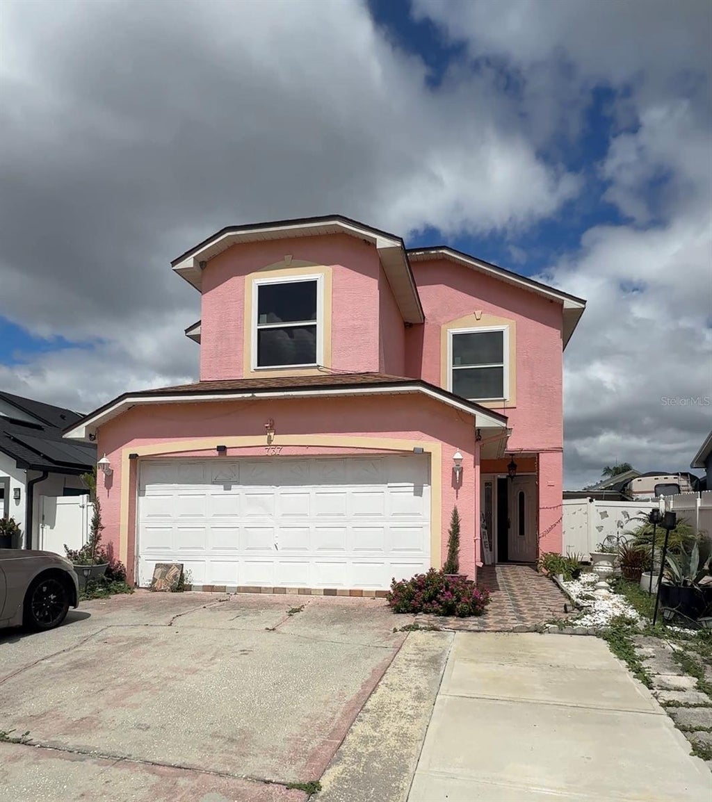 Photo of 737 Country Woods Cir, Kissimmee, FL 34744 (MLS # O6448907)