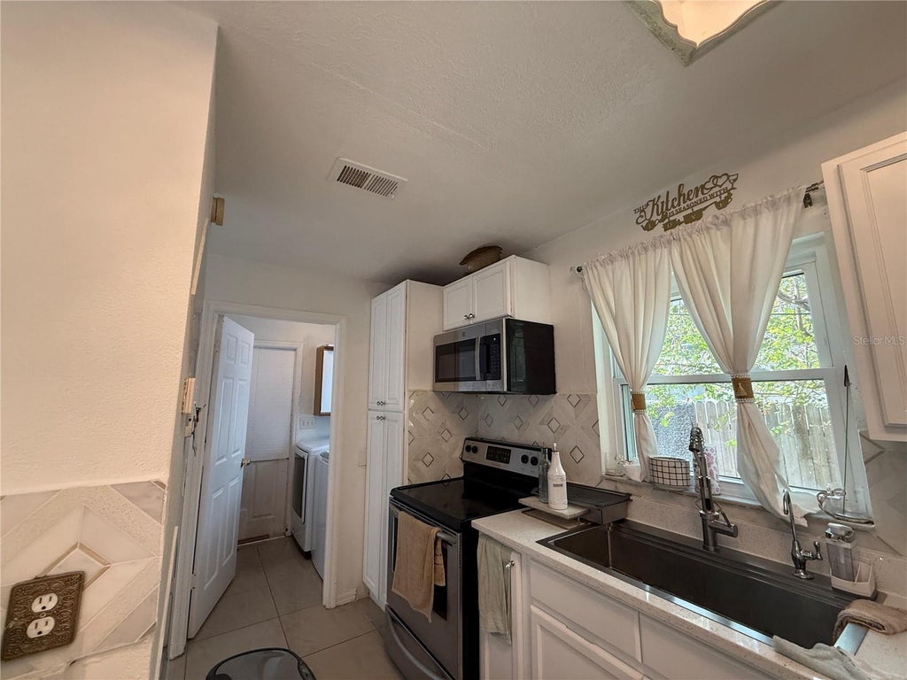 Photo of 737 Country Woods Cir, Kissimmee, FL 34744 (MLS # O6448907)