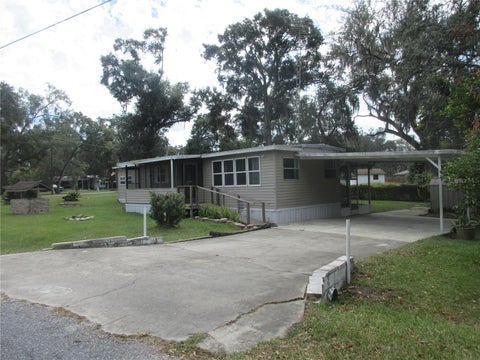 Photo of 1742 SE 169th Terrace Road, Silver Springs, FL 34488 (MLS # OM733314)