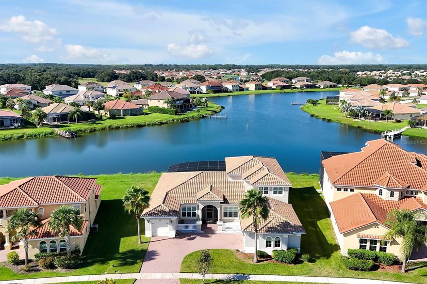 WELCOME HOME! Stunning Water front luxury single house located in the perfect Bellalago Community, a 24-hour guarded gated neighborhood, access to Lake Tohopekaliga, chain of lakes to East Lake Tohopekaliga and Cypress Lake. Premium Lot in the heart of community. Cul-de-sac. Great Privacy. Featured with 5-bedroom & 4.5-bathroom & Loft/Retreat & Den/Office & 3 Car Garage. Master bedroom and 2nd bedroom suit downstairs. Loft and 3rd bedroom suit and other two bedroom upstairs. Lots of upgrades, including huge paved screened back yard, outdoor summer kitchen, gourmet kitchen, upgraded laundry room, trail ceilings in living room and master bedroom. Open-concept floor plan. Abundant natural light throughout the whole house. Step into the house you will be impressed by the amazing living room with completely open four sliding doors lead to grand paved back yard with breathtaking water view. Sides of the foyer are separated formal dining room and bonus room/den/office, well-equipped gourmet kitchen with upgraded countertop, center island, custom cabinetry, stainless steel appliances and backsplash, integrated with a breakfast area and family room connected through three sliding doors to outdoor summer kitchen, perfect for family gatherings or hosting guests. Luxury large master bedroom downstairs features trail ceiling, private access to back yard, double generous closets, garden soaking tub with separate walk-in shower, dual vanities. Bellalago is an amazing water leads community on Lake Tohopekaliga, 24 hours guard gated, hundreds of acres of wooded nature preserves, lake view multi-million-dollar clubhouses, state-of-the-art fitness center, resort-style zero-entry pool, waterpark, spa, dock access, tennis courts, basketball courts, recreation room, playground, dog park, walking/biking trails, boat marina with ramp and lift, restaurant, boardwalk with fishing pier...etc. Schools nearby, only few mins to Publix, markets, shoppings, eatings and entertainments. Short drive to world-class attractions like Disney World, Universal Studios, Sea World, Premium Outlets, Orlando Downtown...etc. Schedule a showing today!