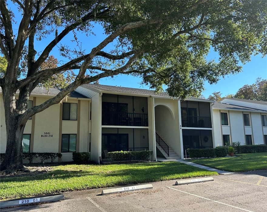 Beautifully updated second (no one above you) floor 2 bedroom 2 bath Condo in the East Lake area of Tarpon Springs. This condo has been upgraded - Luxury Vinyl Plank Floors throughout – New vanities, faucets, toilets in bathrooms – All New Kitchen Appliances (Fridge, Stove, Microwave, Sink, Faucets) Bonus Room (currently used as a third bedroom) has New Washer and Dryer – can be a walk-in closet or office. Assigned parking is close to the door. Pine Ridge is a quiet community with beautifully manicured grounds and well-maintained buildings nestled among trees and lakes. The community amenities include water, sewer, trash, community pool with heated spa, clubhouse, tennis and pickleball courts, grills throughout the community, walking trails, and playground and picnic areas. Call agent directly for showings or further information