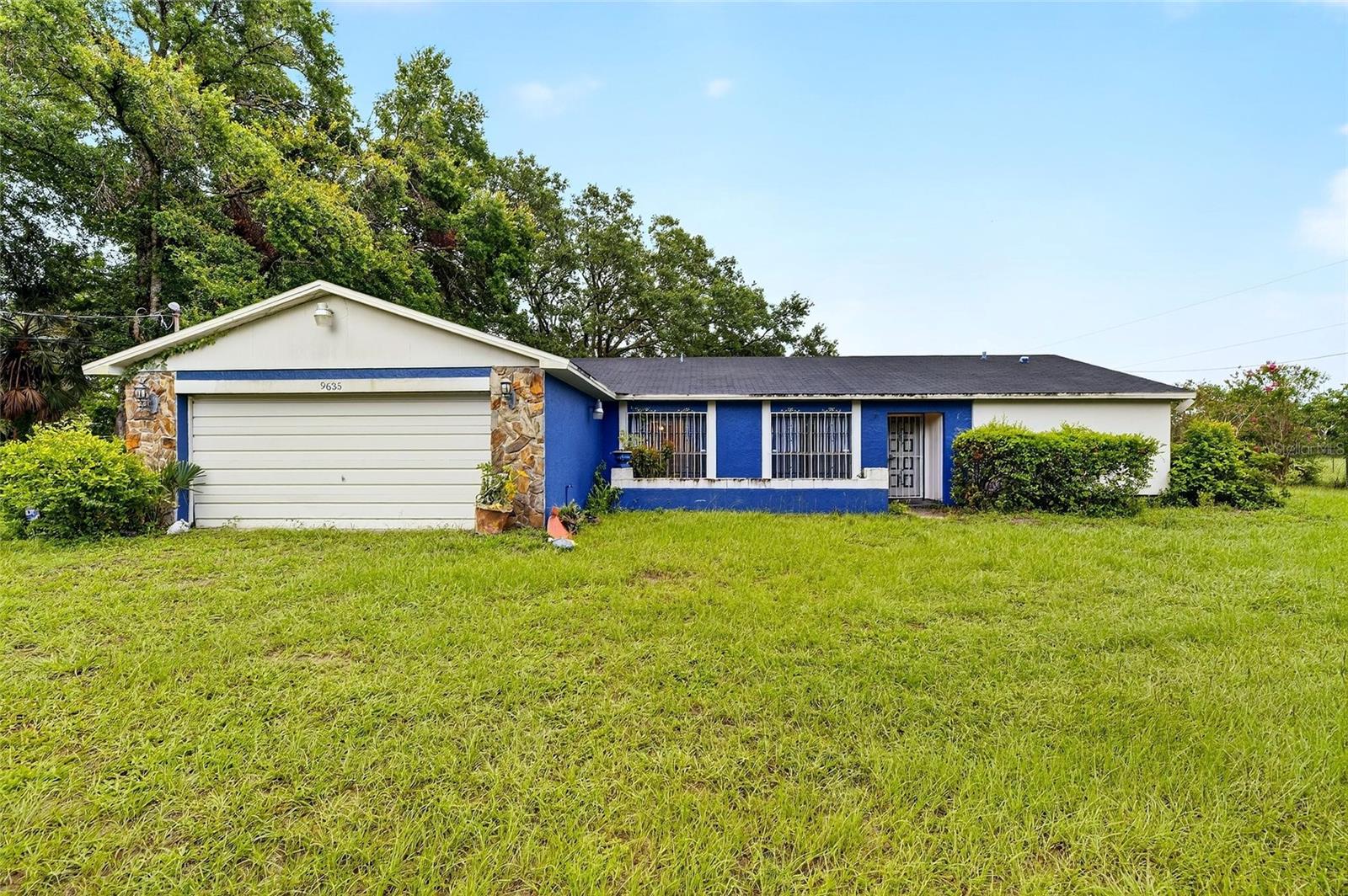 ATTENTION! This Seller is motivated. You need to act fast! Especially since this size and location of property almost never comes around in this area. A beautiful and private fenced 1.86 acre property with the residence at the front, tall oaks for shade and lots of room to spread out in the back. No HOA or additional fees. A/C 2021. Directly next to the beautiful community of Toulon. Newer Water heater. Feels like the country but close to I-75 and many other services. Includes appliances and washer and dryer. Also zoning will allow an additional separate living space to be added on the property. Call Listing agent for exact details.