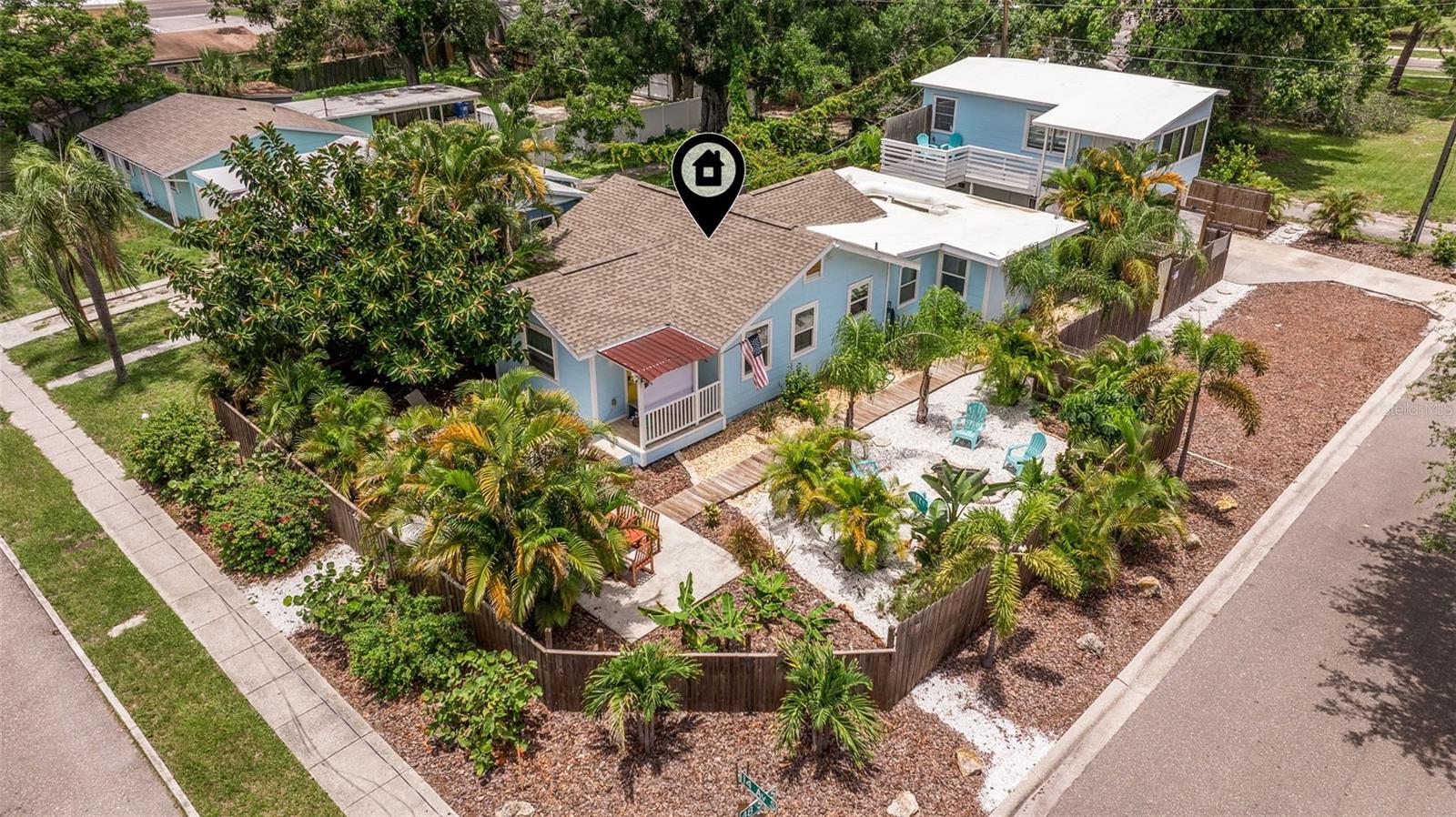 INVESTORS!! Welcome to your private tropical oasis — and income powerhouse — in the heart of St. Petersburg! NO FLOOD ZONE GULFPORT!
Once you step inside, you’ll feel it instantly: This is the one. Fully renovated, meticulously maintained, and truly move-in ready, this stunning property combines modern upgrades with lush, resort-style outdoor living — just minutes from the beaches, vibrant Downtown Gulfport, restaurants, and shopping.
The main house features 4 spacious bedrooms and 2 beautifully remodeled bathrooms and currently brings in $3,150 each month, year after year — reliable income from day one. Inside, you’ll find two cozy living areas and a gorgeous, fully renovated kitchen with hand-installed cabinetry and stainless steel appliances. For added peace of mind, the home has a brand new, fully permitted whole-home repipe and newer windows throughout for energy efficiency.
The backyard is a true paradise with lush tropical landscaping, water features, palm trees, colorful flowers, and a privacy fence that makes it feel like your own island retreat.
Separated by a covered patio is the garage apartment, which generates $1,950 monthly. This unit has been fully remodeled with an eat-in kitchen, new central HVAC and water heater installed in 2020, and unique exterior mural artwork painted by a local artist. Below, the garage and workshop provide great storage or project space — and are ready to be converted into a third income-producing unit, transforming this property into a potential triplex with projected rental income of $6,300+ each month once fully converted.
This property is currently generating a combined $5,100 every month in rental income, making it an ideal opportunity for investors, house-hackers, or anyone seeking multi-generational living with rental income to offset costs.
Don’t miss your chance to own this tropical oasis and rare investment opportunity — schedule your private showing today and see the possibilities for yourself.
