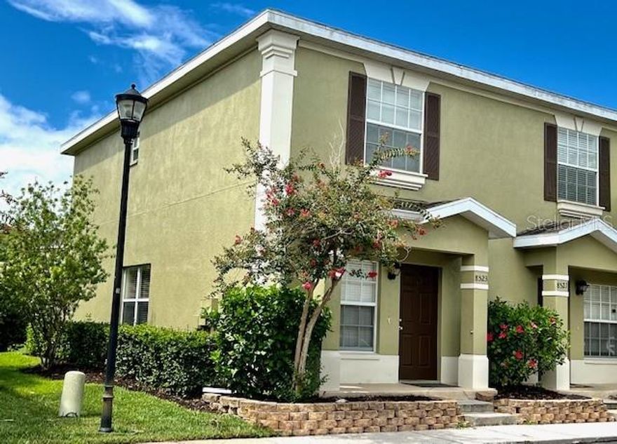 Awesome, well maintained two bedroom and 2.5 bath town home in the gated community of Hammocks, which offers a beautiful community pool. The kitchen opens to the great room featuring the dining and living room, which leads to the sliding screen door to the back yard. This corner unit town home features ceramic tile and wood laminate flooring throughout the first floor with carpet in the stairway and the second floor. Second floor features two master suites with private bathrooms. Laundry room in the hall with washer and dryer included. There is a half bath downstairs for your convenience and to accommodate your guest. You have two assigned parking spaces at your door. The community is located in a quiet neighborhood and close to all conveniences of the New Tampa and Wesley Chapel area. This town home will not last, call to make your appointment today and make it yours.