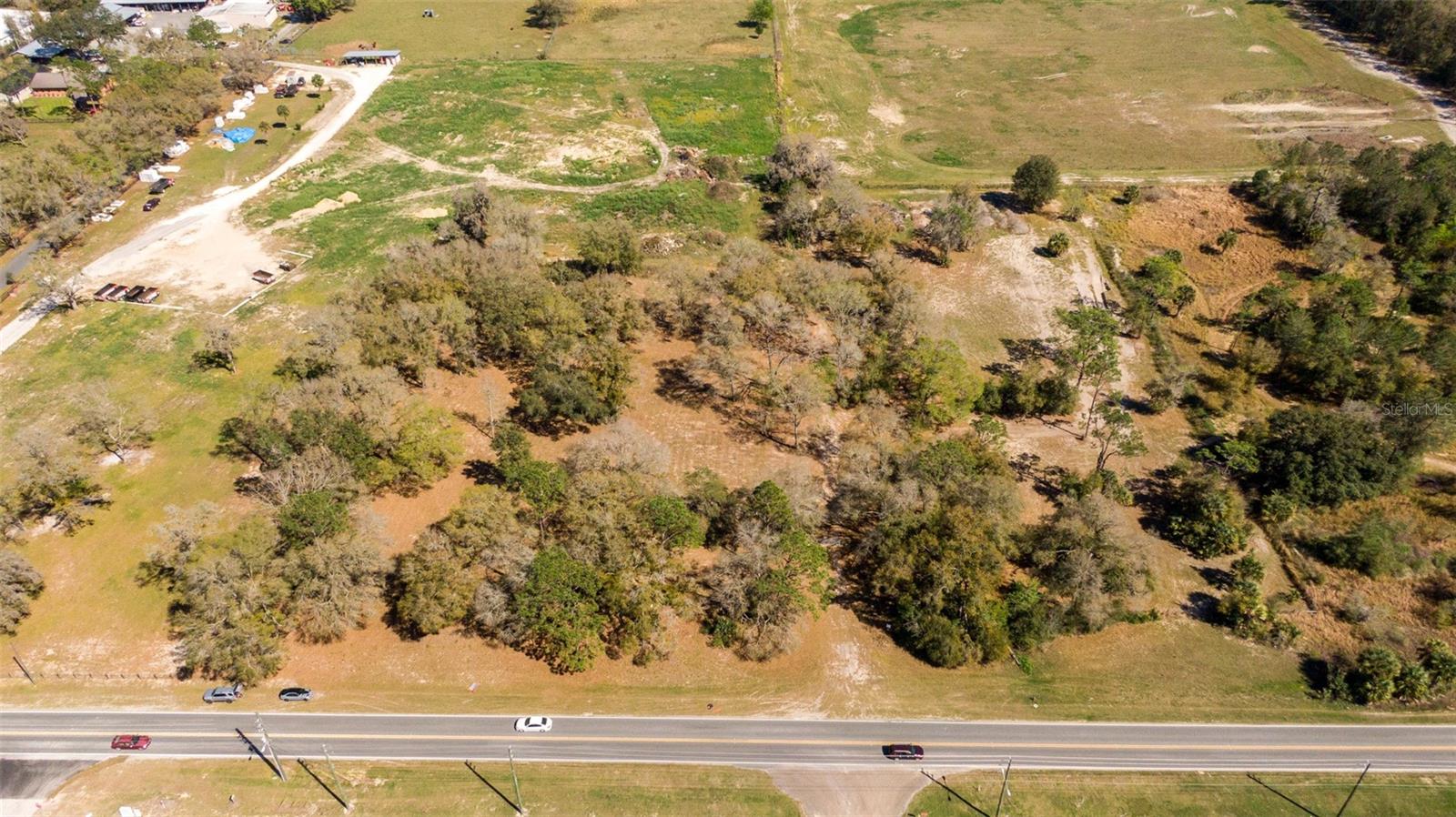 This prime 3.01-acre parcel is strategically located on NE 36th Avenue in Ocala, FL, adjacent to Booster Stadium. The property is gated, partially fenced, and offers excellent accessibility just 6 miles from I-75 and 4 miles from the US-441 corridor. Zoned M1 and M2, it presents an ideal opportunity for manufacturing or distribution businesses. With rising demand for goods and services, this property offers significant potential. Survey available and additional zoning documentation available upon request.