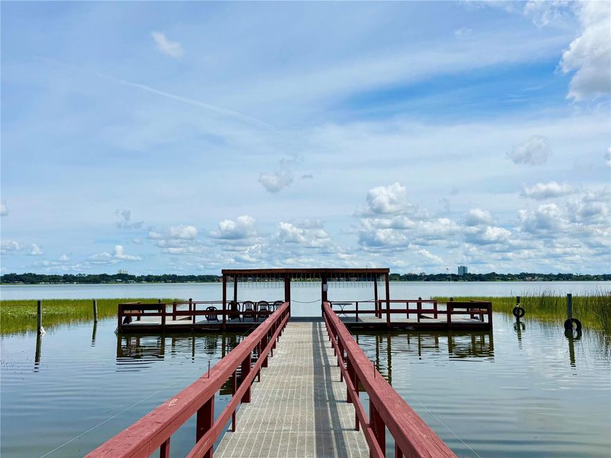 Enjoy lakefront living in the 55+ Imperial harbours community - Welcome to this 3 bedroom 2 bathroom home located in Winter Haven, Florida. Minutes from shopping, dining and entertainment. Featuring 1,218 total square foot, nestled along side the chain of lakes! Sip your morning coffee overlooking scenic lakefront views of Lake Howard, spend weekends by the community pool, or launch your boat from the private dock - All included in your condo fees, as well as cable and internet. This unit is move in ready with optional furniture and a brand new A/C and flooring. Whether you're a full-time or seasonal resident, this home offers a blend of peace, convenience, and lake front charm. Let's schedule your showing today!