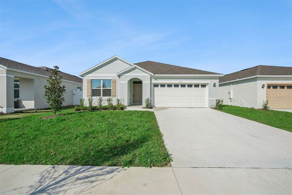 Photo of 3515 Nettle Loop, Tavares, FL 32778 (MLS # O6394281)