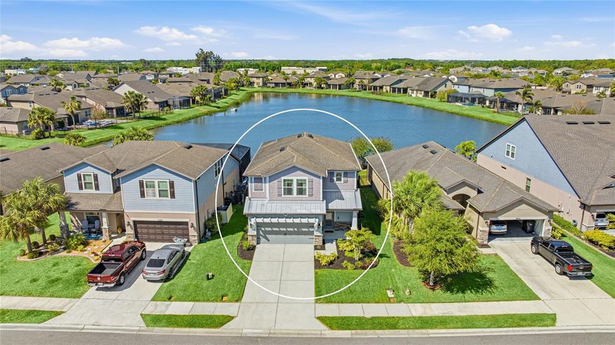 Set against peaceful water views with a heated saltwater pool and spa, this beautifully maintained 4 bedroom, 3 bathroom home offers a seamless blend of indoor comfort and outdoor living. The panoramic screen enclosure frames the water beyond, creating a stunning backdrop, while the custom pool features a self-cleaning system with in-floor jets designed to circulate debris toward the filter for easy maintenance. Inside, a bright and open layout is enhanced by high ceilings, abundant natural light, and clean, modern finishes. A decorative stair railing adds a stylish touch at the entry, while the main living and dining areas connect effortlessly, creating a comfortable and functional space for everyday living. The kitchen is thoughtfully positioned at the rear of the home, overlooking the backyard through sliding glass doors and offering direct access to the lanai, making it easy to stay connected to the outdoor space. Designed with both function and style in mind, the kitchen features granite countertops, stainless steel appliances, ample cabinetry, and a peninsula with bar seating, ideal for casual meals or gathering with guests. A full bedroom and bathroom on the first floor provide added flexibility for guests or multi-generational living. Upstairs, a spacious loft offers a second living area that can easily adapt to your needs, whether used as a media room, playroom, or additional lounge space. The primary suite serves as a peaceful retreat with water views, a well-appointed en suite bathroom, and generous closet space. Two additional bedrooms, a full bathroom, and a conveniently located laundry room complete the upper level. Additional upgrades include new, upgraded carpeting with premium padding, luxury vinyl plank flooring in select areas, a HEPA filtration system with UV light integrated into the HVAC for enhanced air quality, a security system with Google cameras, and added storage solutions such as garage racks and built-in shelving. The outdoor space is designed to be enjoyed year-round, with a screened lanai, heated saltwater pool and spa, and wide water views creating a relaxing and private setting. Located in the sought-after Trevesta community, residents enjoy access to resort-style amenities including a clubhouse, lagoon-style pool, fitness center, playground, and walking paths. HOA benefits include cable, internet, and irrigation, and the home is conveniently located near shopping, dining, and I-75. **THIS PROPERTY QUALIFIES FOR A 1% LENDER INCENTIVE IF USING PREFERRED LENDER. INQUIRE FOR MORE DETAILS.**