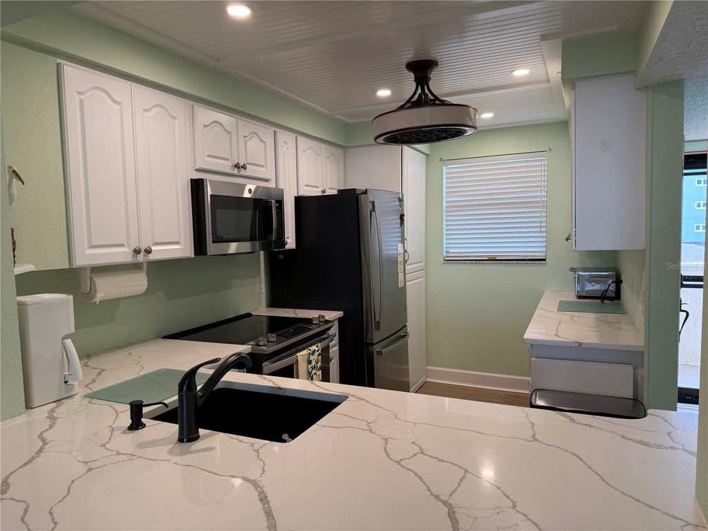 Photo of 18304 Gulf Boulevard #105, Redington Shores, FL 33708 (MLS # A4687771)