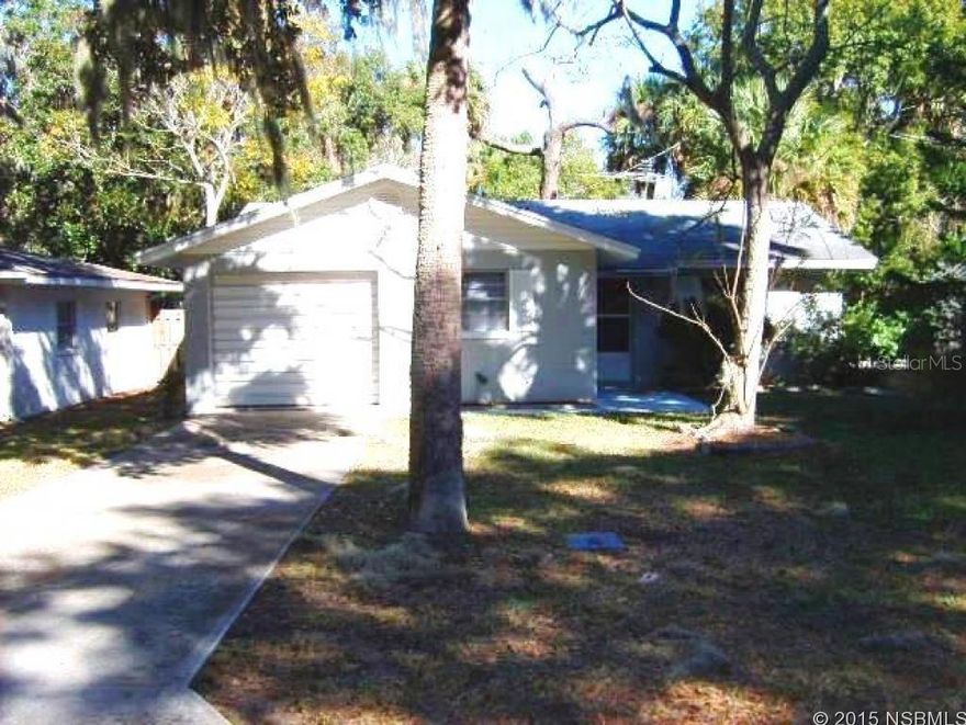 The perfect home for winter visitors, retirees, second home, or if you are just starting out. Located in the heart of beautiful central New Smyrna Beach  between U.S. Hwy. #1 and the river with stately oaks and other lush landscaping. Just a walk to the river and a quick bike ride to the beach. Close to golf, restaurants, shopping, historic Canal St. and all the art and music related activities available. New roof in 2006, new A/C in 2006, with cedar lined closets, and a deep lot for family activities. Terminex bond ;Water: City