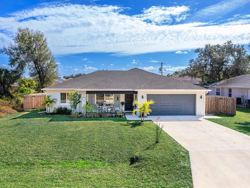 Opportunity to own a like-new home in a convenient, central North Port location.  Shadowbox fencing surrounds the spacious backyard, creating an ideal space for dogs.  Built in 2022, this home features storm-rated impact windows plus an additional storm panel system for peace of mind.  Thoughtful design and aesthetics shine with front and rear porches, high ceilings, and a split-plan open concept that feels warm and inviting.  Tile throughout, no carpet, stone countertops, a large kitchen island, high-end bath finishes, and a huge primary suite with an expansive walk in closet highlight the interior.  Additional features include an indoor utility room with custom storage, extensive garage shelving, a 30-amp generator feed to the electric panel, and a gas-powered generator included with the purchase.  If you’re looking for curb appeal with modern construction and smart upgrades, don’t miss this one. Built by Tenbusch Homes, a local builder known for distinctive designs and quality craftsmanship. Check out their reviews to learn more.