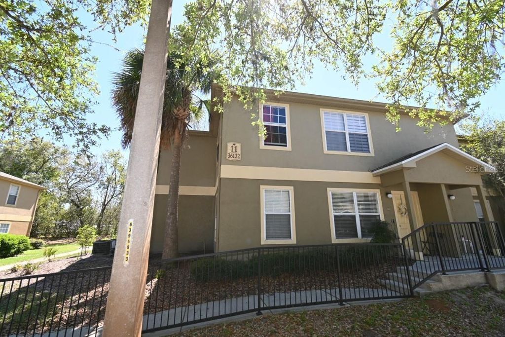 Photo of 36122 Lake Chase Boulevard #104, Zephyrhills, FL 33541 (MLS # TB8489803)