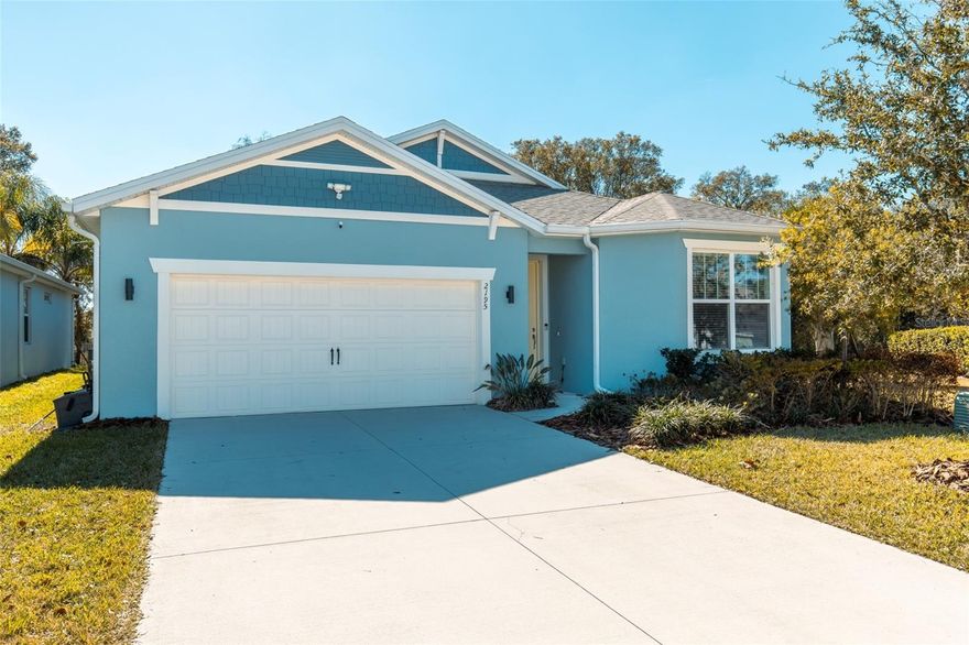 Welcome to 2195 Canopy Terrace Boulevard in DeLand, a beautifully designed Pulte floor plan located in the desirable Canopy Terrace community. Situated on a corner homesite with no rear neighbors, this home provides additional privacy while still being conveniently located near everything DeLand has to enjoy. This thoughtfully designed residence features 4 bedrooms, 2 bathrooms, and approximately 1,850 square feet of living space, with an open layout that makes everyday living comfortable and functional. The spacious kitchen opens directly to the café dining area and gathering room, creating a bright and welcoming central living space. The kitchen includes stainless steel Whirlpool appliances, quartz countertops, bright cabinetry, subway tile backsplash, a large center island, and a walk-in pantry, providing both style and functionality for cooking and entertaining. The owner’s suite serves as a private retreat, complete with a spacious walk-in closet and an en-suite bathroom featuring dual vanities, quartz countertops, and a walk-in shower. Three additional bedrooms and a second bathroom toward the front of the home provide flexibility for guests, family, or a home office. Sliding doors lead to the covered lanai, extending the living space outdoors and creating a comfortable place to relax while enjoying the backyard. Professionally selected finishes throughout the home include luxury wood-look vinyl flooring in the main living areas, designer tile in the bathrooms, and carpeting in the bedrooms, creating a clean and modern interior. Residents of Canopy Terrace have access to community amenities including a pool, playground, picnic areas, and walking trails. Conveniently located just minutes from Downtown DeLand, the property provides easy access to restaurants, shops, parks, and entertainment. The location is also close to I-4, making travel to Orlando, New Smyrna Beach, Daytona Beach, and nearby natural springs convenient.