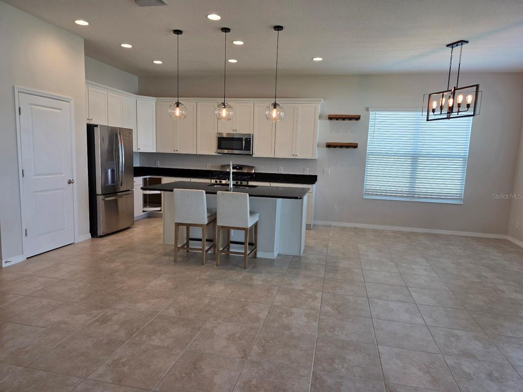 Photo of 722 Grand Hilltop Drive, Apopka, FL 32703 (MLS # O6353867)