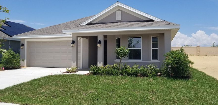 Under Construction. This beautiful home is Located in the Adams Homes Community of Citrus Landing in Davenport very close to 27 and I-4. This home comes loaded with upgrades like 5 1/4" baseboards, 36" Kitchen Cabinets with crown-molding and custom bump, Craftsman style interior and closet doors with brushed nickel lever handles, All MOEN Brushed nickel faucets with Gooseneck One-Touch faucet in Kitchen, Glass-top range, dishwasher and Built-in Microwave above the Range, Upgraded Cut-pile Carpet with 6 lbs padding, Kichler Lantern Style Coach Lights installed on Garage Sides and Entry, Finished Garage, TAEXX Tubes in the walls pest defense system. All our Homes come with our legendary building quality, attention to detail, and Outstanding Customer Service. Make this Home Yours TODAY with only a $1000 deposit. Builder Incentives Available.