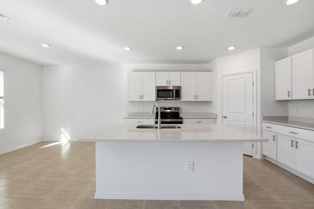 Photo of 13601 Tropical Breeze Way, Hudson, FL 34669 (MLS # TB8412296)