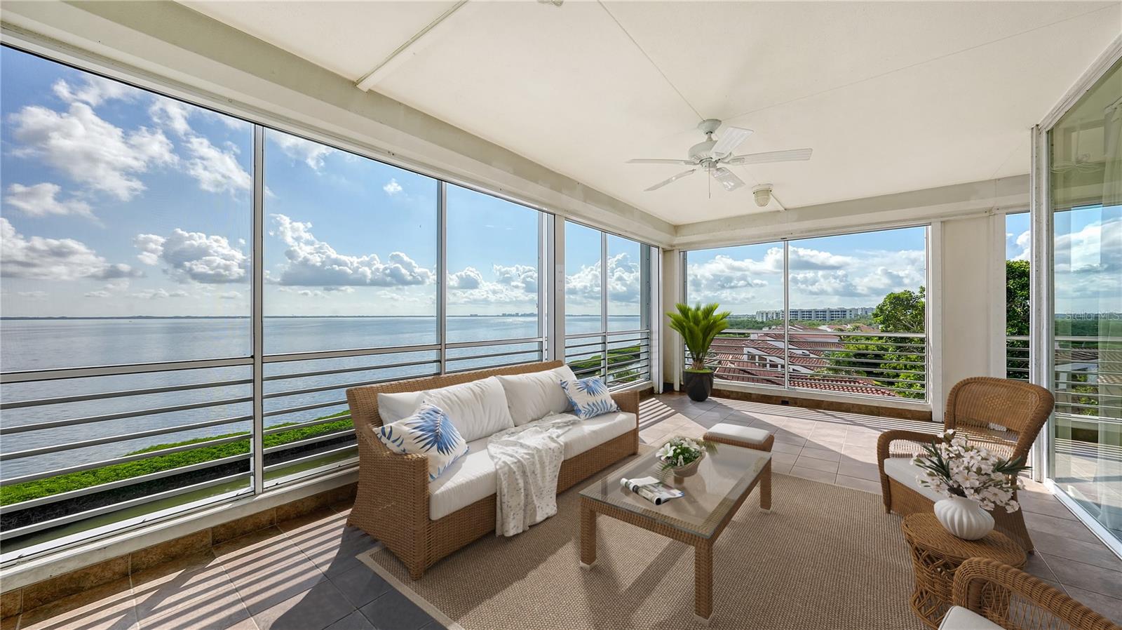 One or more photo(s) has been virtually staged. Experience the ultimate in luxury living with this stunning fourth-floor, corner residence at Marina Bay Building I, where the breathtaking vistas of Sarasota Bay and the Harbourside Golf Course greet you the moment you step inside. Nestled within a secluded yet convenient setting, this unique community offers the spaciousness of single-family living paired with the ease of condominium accommodations, making it the perfect retreat for those seeking both privacy and comfort. Bathed in natural light from walls of floor-to-ceiling glass sliders and oversized windows, this 3,800+ square-foot residence is move-in ready, with an inviting atmosphere designed for immediate enjoyment. The open-concept layout features a wealth of recent updates, including Brazilian Ash hardwood floors, custom-built closets, warm neutral tones throughout, upgraded plumbing and electrical systems, and motorized storm shutters. Additionally, the air conditioning systems were newly replaced in 2021. Upon arrival, you’ll appreciate the convenience of secure, under-building parking (2 spaces!). From there, the private elevator takes you directly to a grand foyer, where double doors open to reveal expansive living and dining areas. The thoughtful design flows seamlessly, allowing for effortless entertaining and daily living. The chef’s kitchen boasts Cambria Quartz countertops, subway tile backsplash, high-end stainless-steel appliances, sleek cabinetry with glass accents, and an island. There’s also a breakfast/wet bar area with a wine cooler, along with a cozy dining nook featuring additional built-in storage. Adjacent to the kitchen, you’ll find a dedicated media room/den, the perfect space for relaxing or gathering with family. Outdoor living is a breeze, with nearly every room in the residence offering access to east and west-facing terraces. The largest terrace, fully screened for added comfort, provides an idyllic setting for savoring bay gentle breezes. The primary bedroom is a private sanctuary, offering terrace access, his-and-her walk-in closets, and a lavish en-suite bathroom adorned with Caesarstone countertops and a wealth of modern upgrades. On the opposite side of the residence, two spacious guest suites are thoughtfully arranged in a split plan, each featuring updated en-suite bathrooms and access to their own private balcony. Marina Bay is a charming, intimate community comprised of just 60 residences, ideally located behind the exclusive gates of the Longboat Key Club. This exceptional neighborhood offers a host of amenities designed to enhance your lifestyle. Residents enjoy 24-hour manned security at the Bay Isles gated entrance, on-site management, and a clubhouse complete with a fitness center, tennis courts, barbecue stations with gas grills, and a bayfront sundeck with gazebos, dining areas, and a heated swimming pool and spa. For beach lovers, deeded access to the residents-only Bay Isles Beach Club is just a short, sunny bike ride away, offering you the perfect escape to Longboat Key’s beautiful shores.