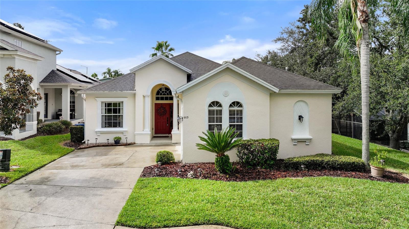 Welcome to 603 Copeland Drive! Situated in the secure, guard-gated community of Calabay Parc at Tower Lake, this home features elegant built-ins, custom architectural details, and thoughtfully designed niches that add both charm and functionality. The built-in desk area complements the eat-in kitchen, complete with a matching custom windowsill that enhances the home's design. This 4-bedroom, 3-bath Tamarind model includes both a primary and secondary suite. The open split floor plan provides privacy for all family members. The heated, south-facing pool and spa offer a private retreat. Recent upgrades include a pool pump (3 years), new A/C, new stainless steel appliances, an 8-year-old hot water tank, and a remodeled kitchen. The community boasts its own private lake and clubhouse, with yard maintenance included in the HOA fees. Conveniently located near medical facilities, shopping, and theme parks. Schedule your private tour today!