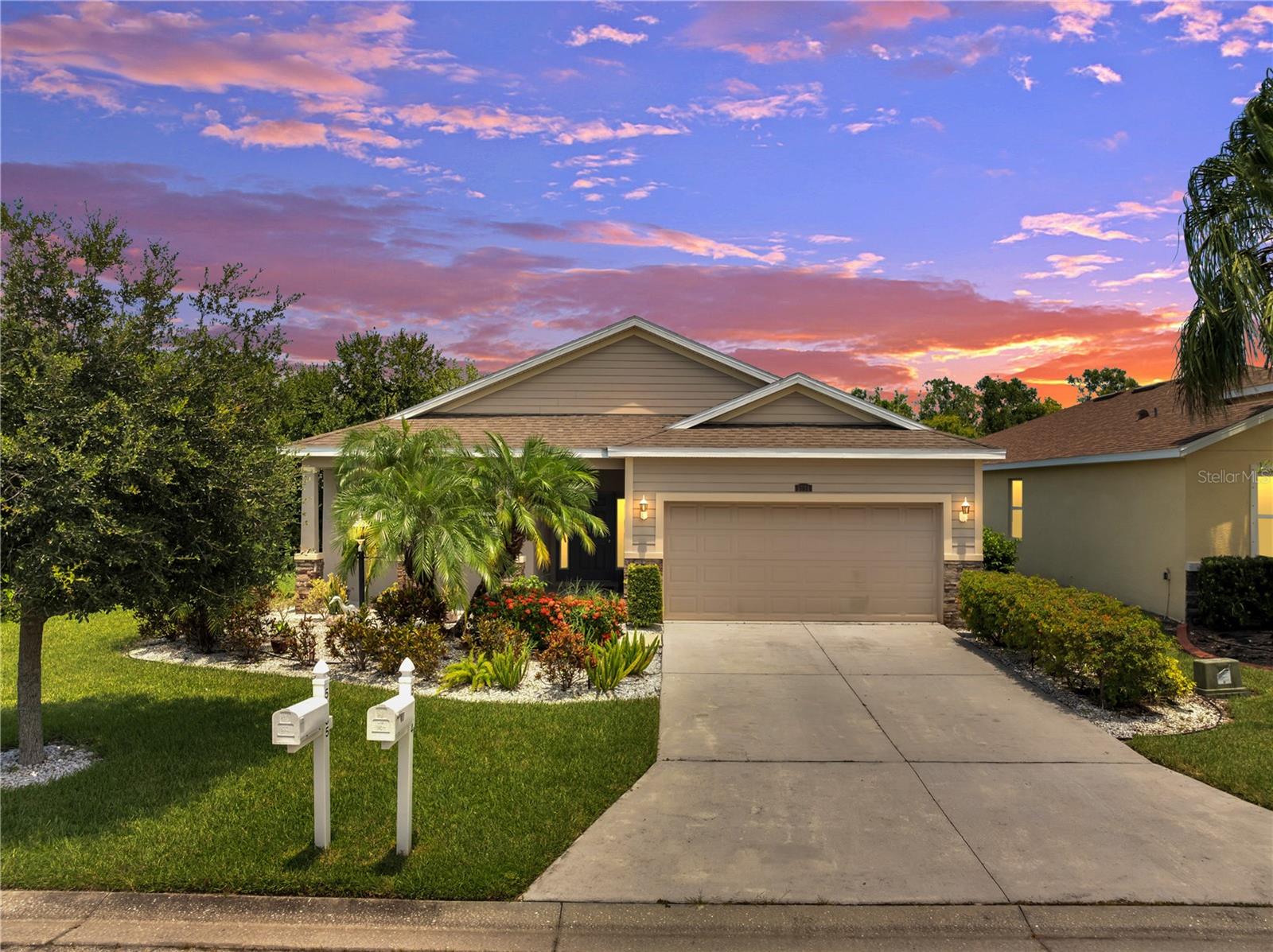 Discover the perfect blend of elegance, comfort, and location in this beautifully appointed 3-bed, 2-bath corner-lot home in Ellenton’s sought-after Covered Bridge Estates. Framed by serene water views, the residence features fresh crown molding and baseboards, modern lighting, and a welcoming enclosed lanai creating a warm yet refined atmosphere.
At the heart of the home, the spacious kitchen impresses with a generous island, sleek quartz countertops, and ample workspace perfect for both everyday living and entertaining. All major appliances are included, and the intelligently designed laundry room is located inside the home, with direct garage access and a walk-in pantry for optimal storage and convenience.
A fully fenced yard, 5-zone sprinkler system, and carefully chosen finishes enhance both style and function. This home offers a lifestyle where coastal beauty and suburban tranquility meet…an ideal choice for buyers seeking the best of Florida living.
Within the community, residents enjoy a wide array of lifestyle amenities. Take refreshing laps in the heated pool, keep active in the fitness center or billiards room, or stay social with access to the clubhouse (which includes a kitchen), tennis and basketball courts, and playgrounds for all ages. Conveniently located just minutes from I-75, you’ll have effortless access to Ellenton Premium Outlets, convenience stores and a variety of dining and entertainment options. A short 15–20 minute drive places you on the sun-kissed shores of Anna Maria Island’s beaches or strolling downtown Sarasota or St. Petersburg.