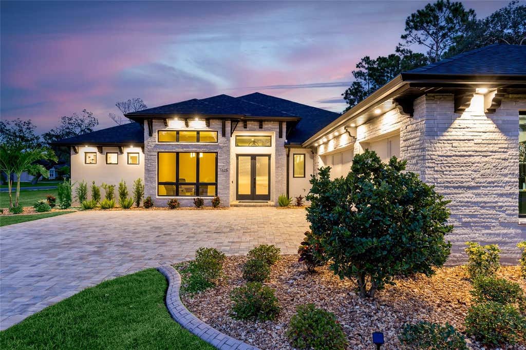 Photo of 1625 Turnbull Crossings Drive, New Smyrna Beach, FL 32168 (MLS # O6429634)