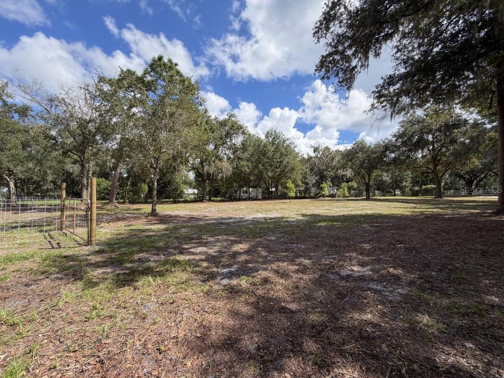 Photo of 6916 Coronet Road, Lakeland, FL 33811 (MLS # A4707686)