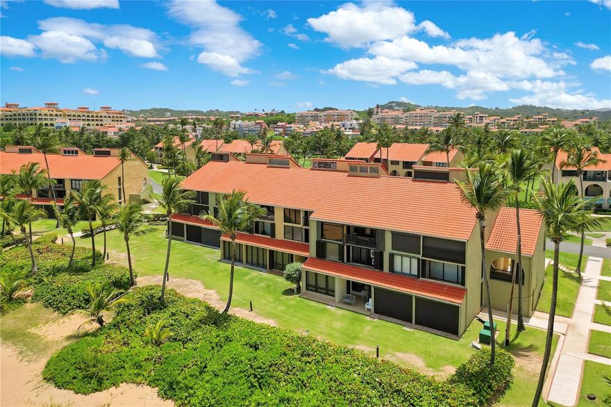 Discover beachfront living in this 1,391 sq ft villa at Beach Village in Palmas Del Mar, with 2 bedrooms and 2 bathrooms. Enjoy ocean views, the sound of waves, and a golf course view. It has a modern kitchen, dining, and living areas with beach views. Features include mini-split AC, porcelain tiles, updated bathrooms, and a renovated kitchen for comfort. Added bonuses are electric storm shutters and a battery system. Close to the beach, Wyndham Hotel, Tennis Club, & Golf Course, this villa offers prime beachfront living. HOA: $614.66 monthly, CRIM: $1,349 annually and Palmas del Mar Homeowners Association: $1,300 annually.