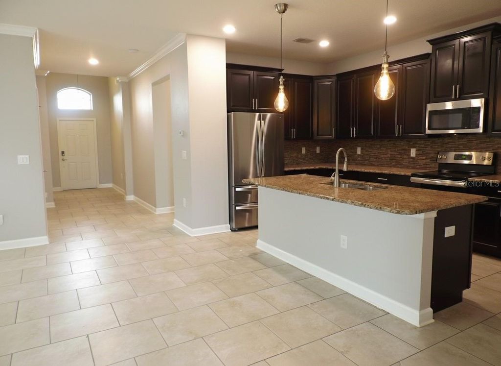 Photo of 2169 Lake Side Avenue, Davenport, FL 33837 (MLS # S5140410)