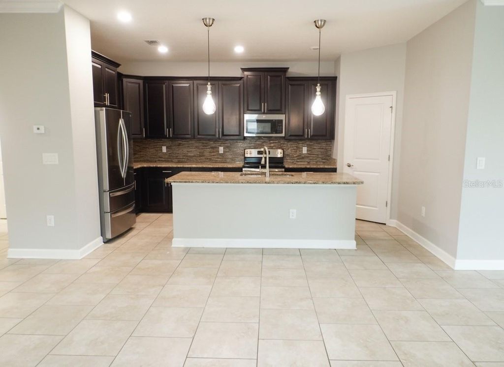 Photo of 2169 Lake Side Avenue, Davenport, FL 33837 (MLS # S5140410)