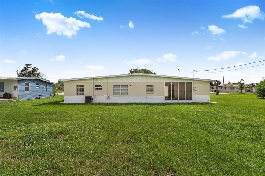 Photo of 258 Seminole Boulevard NW, Port Charlotte, FL 33952 (MLS # TB8435719)