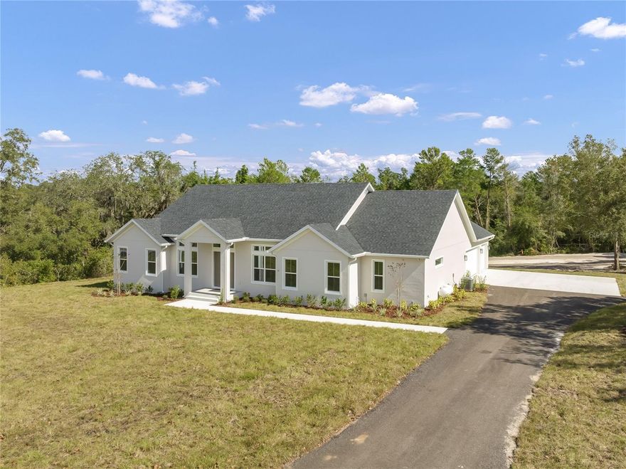 One or more photo(s) has been virtually staged. This incredible well built home is perfectly situated on 1.47 acres in the highly sought after Orlandia Heights neighborhood in beautiful Debary. This property offers the perfect blend of modern luxury and private, tranquil living.
Step inside this 4-bedroom, 3.5-bathroom home boasting 2,898 sq. ft. of thoughtfully designed living space. The open floor plan features a 42" ventless gas fireplace, engineered hardwood floors, and an abundance of natural light. The gourmet kitchen is a true showstopper—complete with quartz countertops, a large island, premium KitchenAid appliances, an oversized pantry, and ample cabinetry.
The luxurious primary suite includes a spacious walk-in closet and a spa-like bathroom with elegant finishes. Two additional bedrooms are ensuite, offering comfort and privacy, while the fourth bedroom provides flexibility as a home office or guest space.
Enjoy peaceful views from the covered back patio, overlooking the cleared lot and surrounding trees—the perfect setting for relaxing or entertaining. An oversized 1,100 sq. ft. three-car garage provides plenty of room for vehicles, storage, or hobbies.
The home is pre-plumbed for an outdoor kitchen and pool/spa and pre-wired for an outdoor barn, offering endless possibilities for future outdoor living. (Pool and furniture are virtually staged) 
Every detail has been carefully considered in this one-of-a-kind home. Experience serene living in one of Debary’s most desirable communities
Conveniently located minuets away from 17-92 and I-4.  Don't miss your chance to own this remarkable residence!