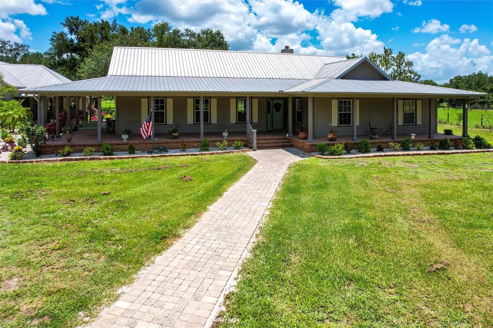 Escape to your private paradise on 14 high-and-dry, beautifully landscaped acres. This meticulously maintained 3-bedroom, 2-bath home offers comfort, functionality, and peace of mind with recent upgrades including a brand-new A/C system, water heater, new water filtration, and a powerful 26 kW whole-house Generac generator is set to be installed in July.
The property features a spacious mother-in-law suite, ideal for guests or multi-generational living, as well as ample parking with a 2-car garage and carport.
Equestrian lovers will appreciate the 3-stall horse barn, tack room, and separate feed barn, all thoughtfully designed for convenience and care. Your four-legged companions are equally considered with a 7 dog kennel and run.
Enjoy added security and surveillance with a 18-camera system already installed, electric front gate and relax in the serenity of professionally landscaped grounds that surround your home.
Whether you’re looking for a quiet retreat, space for animals, or a turnkey homestead, this property offers the perfect blend of privacy, luxury, and functionality.
