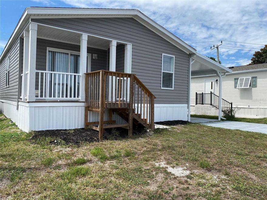 One or more photo(s) has been virtually staged. Own this Beautiful New Home on a 40 YEAR LEASED LOT $99 FOR THE ENTIRE YEAR!!! Space abounds in this 2-bedroom, 2-bath home that offers the perfect blend of affordability, comfort, and Florida sunshine in one of the area’s most desirable WATERFRONT communities with direct GULF ACCESS via the Myakka River. Outside, sit in the sun on the front deck and enjoy your morning coffee or afternoon tea. Harbor Cove’s lifestyle is truly unmatched. The two-story clubhouse overlooking the 90-slip marina is the heart of the community, hosting dances, trivia nights, entertainment shows, card games, billiards, picnics, and more. The occasional food truck and vegetable market visits are a treat and very convenient. Residents enjoy two swimming pools, a hot tub, tennis and pickleball, bocce, and shuffleboard. With boat slips available for a minor fee, you can cruise miles of scenic waterways and enjoy some truly great fishing along the way. With beaches, golf, restaurants, Costco, retail shops, and quality medical services all nearby, this is the perfect place to enjoy an active, social, and relaxed Florida lifestyle.