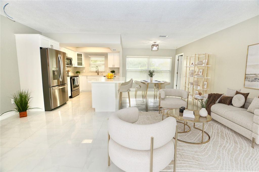 Photo of 14540 Diplomat Drive, Tampa, FL 33613 (MLS # TB8447366)