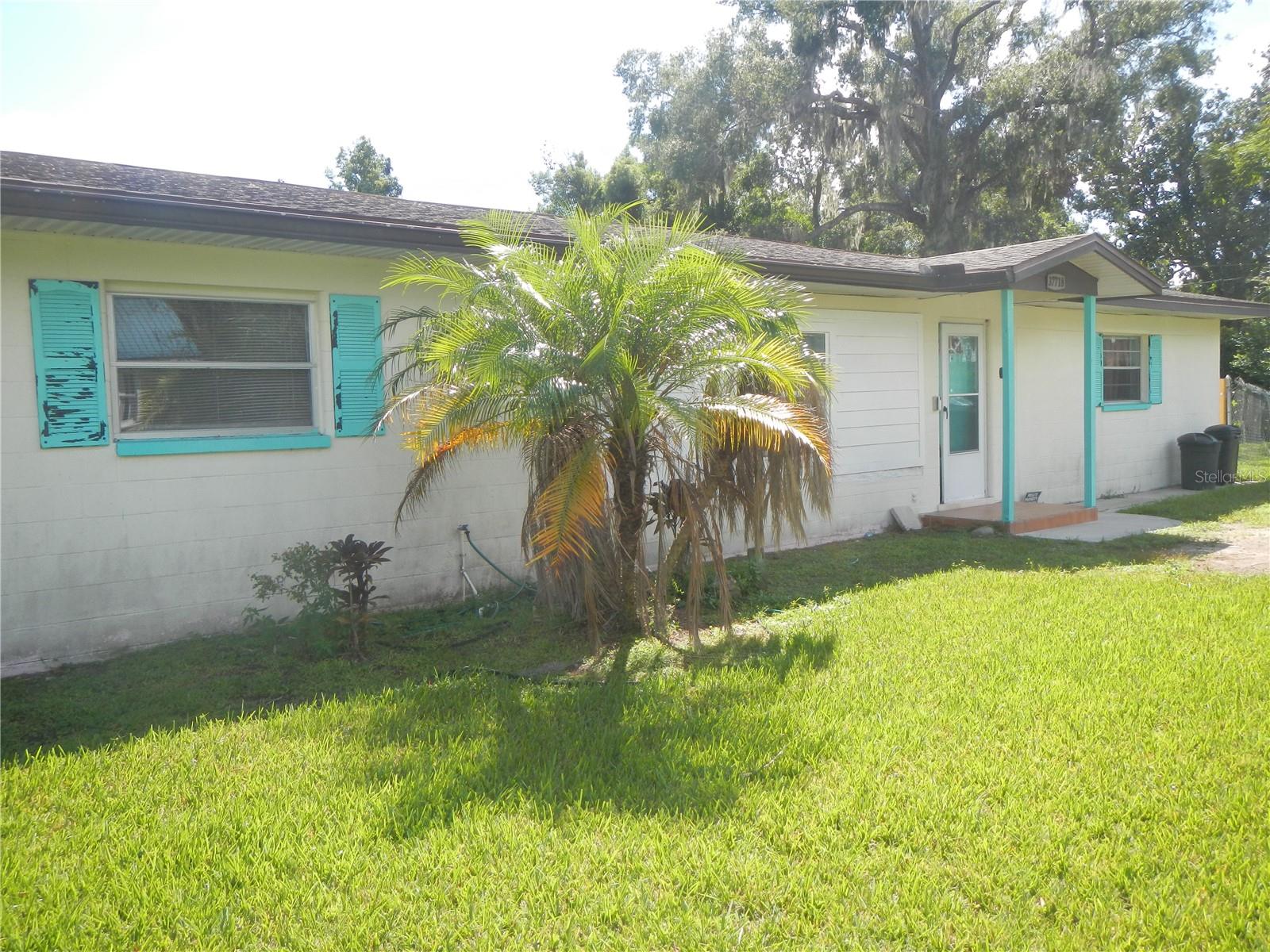 This home is over 1900 heated square feet on two city lots just under 1/2 acre corner lot. The back yard is fenced with chain link with double size gates. The kitchen has two high top counter breakfast bars with lots of oak cabinets. The Split plan has 19x19 Primary Bedroom with double closets and adjacent bath.