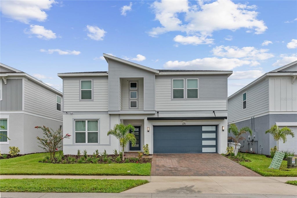 Photo of 16175 Coastal Cove Lane, Clermont, FL 34714 (MLS # O6438475)