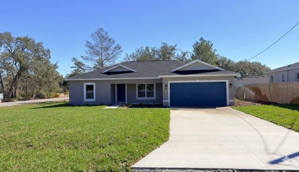 Photo of 77 Malauka Pass, Ocklawaha, FL 32179 (MLS # O6385766)