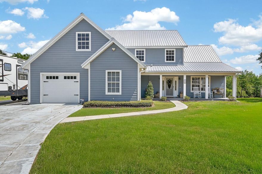 Tucked along the shores of Lake Beresford, this inviting DeLand home offers a rare waterfront setting with an approximately 8-foot-deep canal, providing easy and reliable access for boating out to the St. Johns River. With no HOA and just over 3000 square feet of living space, this property delivers both freedom and functionality in a scenic setting. Inside, the home features refreshed interior paint (2026), laminate flooring (2021), plantation shutters, and a central vacuum system for added convenience. The kitchen, bathroom, and laundry room have been thoughtfully updated, creating a clean and comfortable feel while maintaining the home’s original charm. A Florida room with newly finished stained concrete floors (2026) adds a versatile space filled with natural light—ideal for relaxing or entertaining. Character details shine throughout, including tongue-and-groove porch ceilings and stylish shiplap accents that bring warmth and texture to the home’s design. Outdoors, a newly added paver fire pit (2026) creates a welcoming gathering space, while the chain link fenced yard (2026) adds both function and flexibility. RV and generator hookups provide additional practicality for a variety of lifestyles. For water enthusiasts, the boathouse with a belt driven lift with aluminum cradle (2023) makes lake access effortless. Additional updates include exterior paint (2022) and a roof replacement (2022), offering peace of mind for years to come. This property is a rare opportunity to enjoy laid-back lakeside living with modern touches in one of DeLand’s most scenic settings.