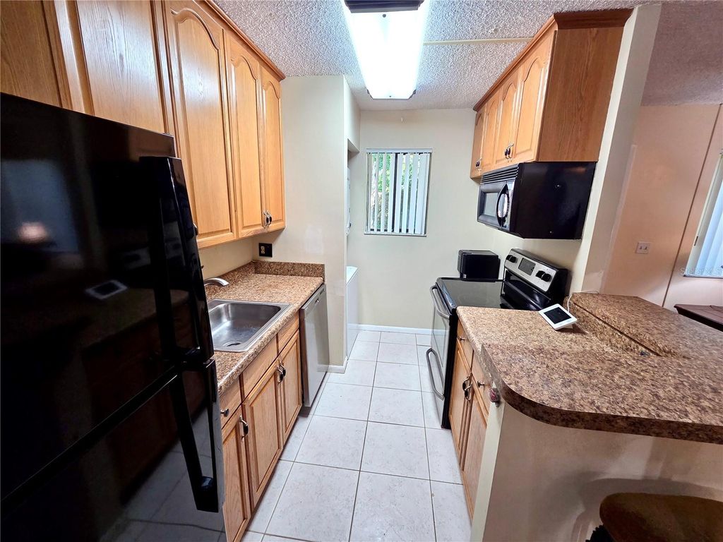 Photo of 588 Trace Circle #102, Deerfield Beach, FL 33441 (MLS # GC534933)