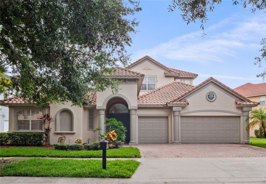 Beautiful Mediterranean style courtyard home in the award-winning Providence, a gated golf and country club community. Conveniently located near attractions, restaurants, and newly developed shopping. 
This home offers 4 bedrooms and 3.5 baths in the main house, plus an attached private entry in-law suite with its own bathroom. The impressive double-door entry opens to a spacious courtyard and pool, complete with lanai.
Inside, retractable glass doors lead to the large family room with volume ceilings. The gourmet kitchen features 42” custom cabinets, granite countertops, tile backsplash, stainless steel appliances (including refrigerator and dishwasher), and a breakfast nook. This home includes a formal living and dining room with water views.
The first-floor master suite has an oversized bath with dual vanities, spa tub, large shower, and walk-in closet. Upstairs are two bedrooms, a large bonus/3rd bedroom, and a versatile loft suitable for a game room, media room, or office.
Additional highlights include a 3-car garage, paver driveway, tile roof, crown moldings, security system, and an energy-efficient design. A dedicated well pump for irrigation significantly reduces water costs and keeps landscaping lush year-round.
Community amenities include a championship golf course, multiple pools, tennis courts, playground, restaurant, and fitness center. Located on a quiet cul-de-sac.