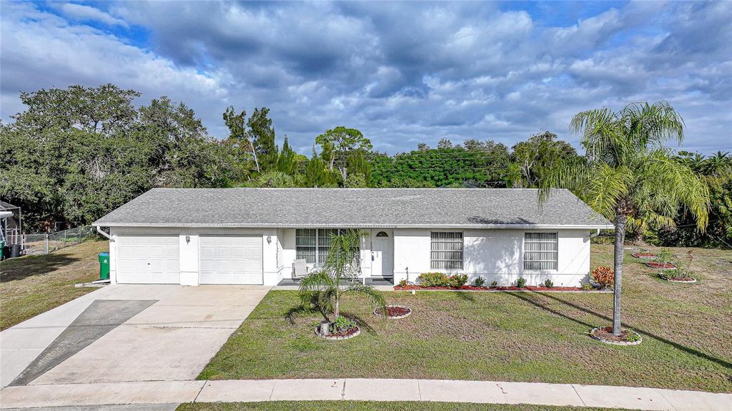 Photo of 2155 Lakeshore Circle, Port Charlotte, FL 33952 (MLS # C7519148)
