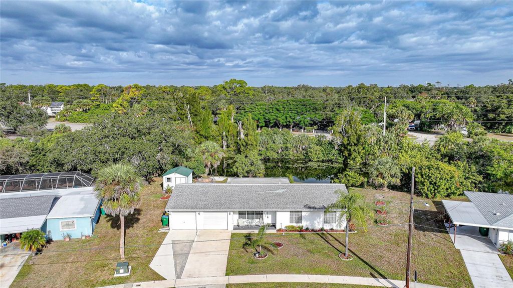 Photo of 2155 Lakeshore Circle, Port Charlotte, FL 33952 (MLS # C7519148)