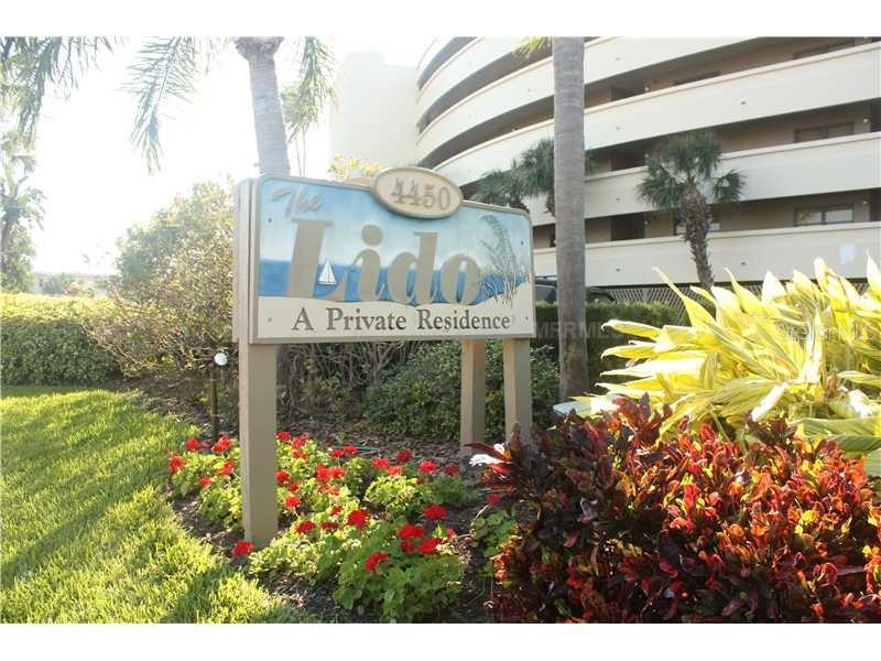The Lido condominium on St. Pete Beach has proven its resilience by withstanding a significant 100-year storm event. While the landscaping suffered damage, the building itself remained unscathed, thanks in part to the protective beachside dunes. Efforts are currently underway to restore these dunes and replant sea oats to reinforce this natural barrier. Plans are also in place to rejuvenate the lush landscaping beginning in July 2025.
Unit 110, situated at the center of The Lido’s U-shaped design, offers direct Gulf views and overlooks the pool and hot tub. Positioned on the second level, above the under-building garage, this unit features a spacious balcony with unobstructed vistas of the Gulf of Mexico. The condo comprises two generous bedrooms, two bathrooms, a large living and dining area, and a well-appointed kitchen with ample cabinetry and preparation space. The master bedroom accommodates substantial furniture and includes an ensuite bathroom with a walk-in closet and dual sink areas. The second bedroom is sizable enough for two queen beds, and a flexible space can serve as an office, breakfast nook, or additional sleeping area. A full-sized washer and dryer are conveniently located within the unit. Offered fully furnished, this condo is move-in ready, suitable for both full-time living and part-time residency.
The Lido community consists of 72 units and offers amenities such as a pool, community room, tennis court (also lined for pickleball), and a fitness room. In 2022, the Gulf-side pool and pool deck were completely replaced, and residents have access to a private walkway leading to the pristine sands of St. Pete Beach. Each unit includes an under-building parking spot, with additional parking available for second vehicles and guests in the front lot. A new roof has been installed in the last couple of months. The location provides convenient access to grocery stores, pharmacies, restaurants, and is approximately a seven-minute drive to I-275, offering quick routes to downtown St. Petersburg and the St. Pete/Clearwater or Tampa International airports.