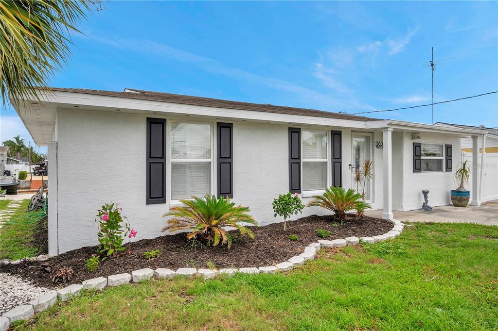 Photo of 13804 Malcolm Avenue, Hudson, FL 34667 (MLS # TB8402119)